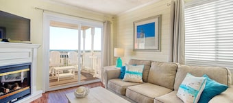 Newly-updated luxury beach condo with ocean views, balcony, & beach access