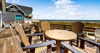 Three-story beachfront home with private pool, hot tub, decks, & ocean views