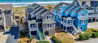 Three-story beachfront home with private pool, hot tub, decks, & ocean views
