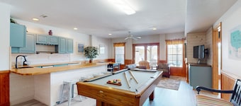 Three-story beachfront home with private pool, hot tub, decks, & ocean views