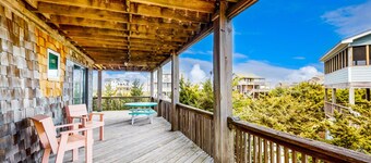 Updated home with ocean & sound views, screened porch, balcony, pool access