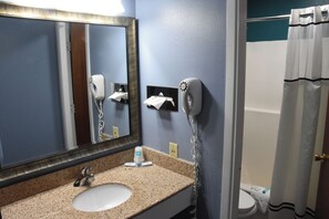 Single Room, 1 King Bed | Bathroom | Combined shower/bathtub, hair dryer, towels, soap