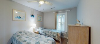 Beautifully updated condo with outdoor pool, beach access, AC & washer/dryer