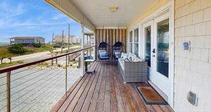 Updated home steps away from the beach with Outside Patio, Central A/C, and Wifi