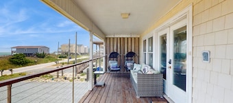 Updated home steps away from the beach with Outside Patio, Central A/C, and Wifi
