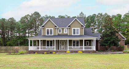 Exquisite home with pool, enclosed yard, fireplace, central AC, & washer/dryer