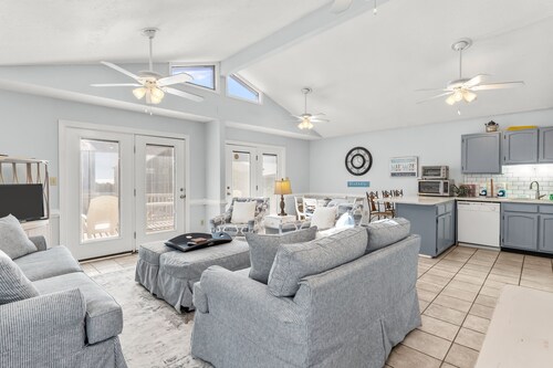 Large and roomy house across from the beach with WiFi, W/D, central AC, and deck