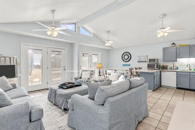 Large and roomy house across from the beach with WiFi, W/D, central AC, and deck