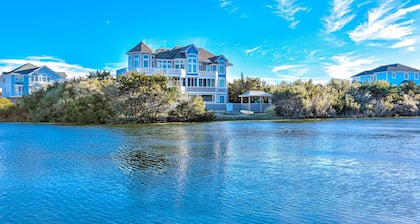Waterfront home with theatre, private pool & hot tub - dog-friendly