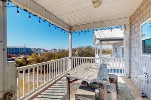 Outdoor dining - Dog-friendly, water-view home with scenic balcony, grill, washer/dryer & AC (Surf City)