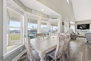 Dining - Chic house with kayaks, balcony dining, beach chairs, central AC, & washer/dryer (Surf City)