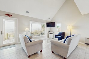 Télévision, lecteur de DVD, livres