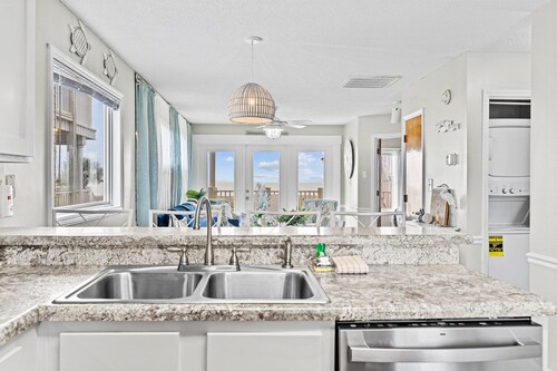 Lower Waterfront Condo with Oceanfront Balcony, Shared Outdoor Pool, WiFi & AC