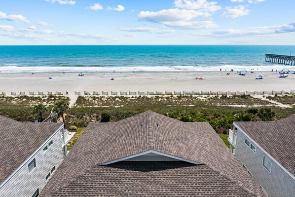 On the beach - Lower Waterfront Condo with Oceanfront Balcony, Shared Outdoor Pool, WiFi & AC (Holden Beach)