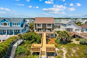 Exterior - Spacious oceanfront duplex with two kitchens, large deck, WiFi, & AC - dogs OK (Holden Beach)