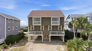 Exterior - Spacious oceanfront duplex with two kitchens, large deck, WiFi, & AC - dogs OK (Holden Beach)