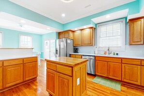 Fridge, microwave, oven, stovetop - Beachside home with ocean view decks, WiFi, and washer/dryer (Holden Beach)