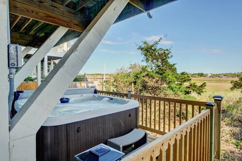 Dog-friendly home with NEW FLOORING THROUGHOUT, decks, & private hot tub