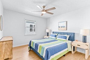 4 bedrooms, travel crib, free WiFi, bed sheets - Golden Oasis: Cheerful dog-friendly home with kitchen, balcony, patio, & W/D - close to beach (Oak Island)