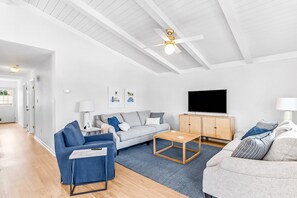 TV - Cheerful dog-friendly home with kitchen, balcony, patio, & W/D - close to beach (Oak Island)