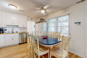 Dining - Inviting dog-friendly home with patio, full kitchen, central AC, & W/D (Oak Island)