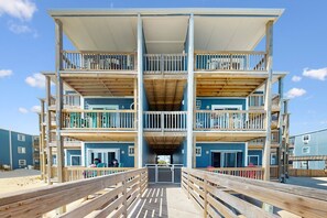 Property grounds - Beachfront condo with ocean views, balcony, WiFi, & shared grills (North Topsail Beach)