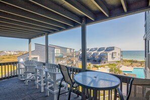 Outdoor dining - Oceanfront condo with elevator, private beach, ocean view, community pool, grill (North Topsail Beach)