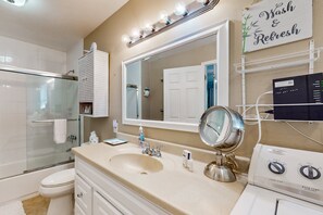 Shower, hair dryer, towels