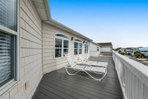 Terrace/patio - Sprawling home with pool access, balconies, enclosed yard, & grill - dogs ok (Ocean Isle Beach)