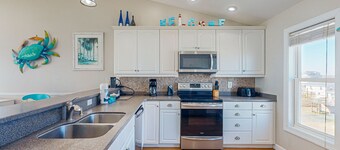 Oceanfront, dog-friendly home with hot tub, beach views & waterfront decks