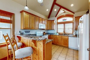 Fridge, microwave, oven, stovetop - Oceanfront home with private pool, hot tub, game room, sundecks & fast WiFi (Waves)