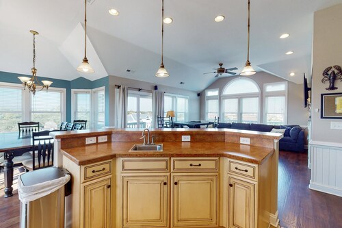 Stately and dog-friendly beach home near water with private pool & hot tub