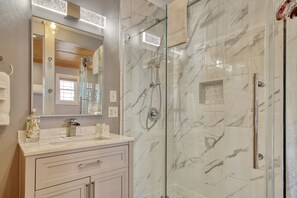 Shower, hair dryer, towels - Unique riverfront home with two suites, high-speed WiFi, & private dock (Shallotte)