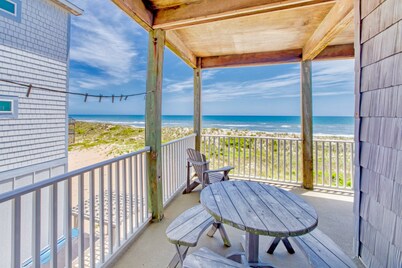 Second-floor oceanfront home with outdoor pool, hot tub, pool table, & W/D