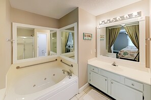 Shower, jetted tub, hair dryer, towels