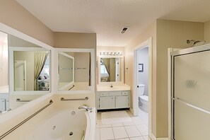 Shower, jetted tub, hair dryer, towels