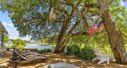 Gorgeous waterfront home with private hot tub, pool, views, deck, & fireplace