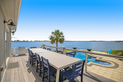 Luxurious private island home with pool, wraparound deck, & firepit