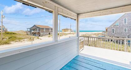 Ocean-view home steps from the beach with deck, outdoor shower, & central AC