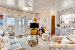 TV, DVD player, video library, stereo - Inviting Oceanfront Home w/Covered & Screened-In Porches, Free WiFi, Sundeck, AC (Holden Beach)