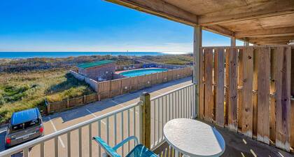 Dog-friendly oceanfront condo with balcony, outdoor pool, hot tub, and central AC
