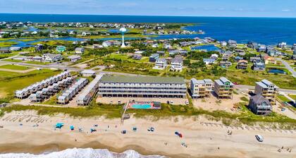 Dog-friendly oceanfront condo with balcony, outdoor pool, hot tub, and central AC