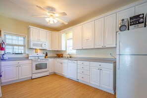 Fridge, microwave, oven, stovetop - Dog-friendly oceanfront condo with balcony, outdoor pool, hot tub, and central AC (Hatteras)