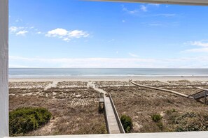 On the beach - Renovated home w/two Oceanfront Covered Porches, Free WiFi, Central AC, W/D (Holden Beach)