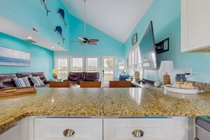 TV, fireplace - Waterway front home w/ private pool, fenced yard, boat dock, short walk to beach (Holden Beach)