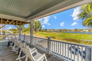 Property grounds - Waterway front home w/ private pool, fenced yard, boat dock, short walk to beach (Holden Beach)