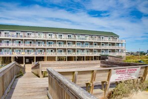 Exterior - Oceanfront condo with wraparound balcony, fast WiFi, and on-site pool/hot tub (Hatteras)