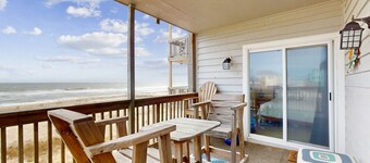 Oceanfront condo with outdoor pool, W/D BBQ, and balcony