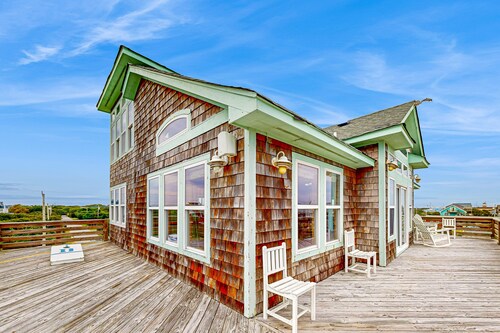 Towering beach house with private pool, hot tub, decks & ocean views