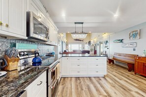 Fridge, microwave, oven, stovetop - Beachfront Home with Ocean-View Deck, Outdoor Shower, WiFi, AC & Washer/Dryer (Holden Beach)